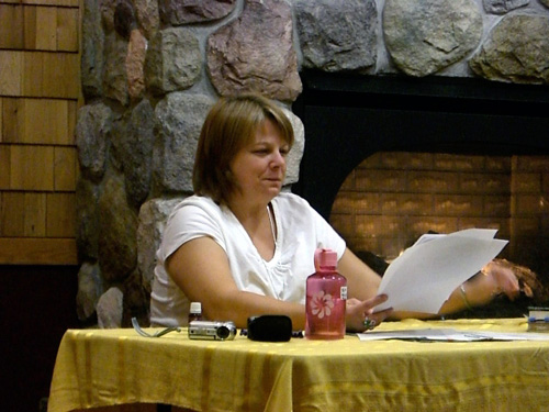 Kim at Poetry Potluck, photo by Beth Millner